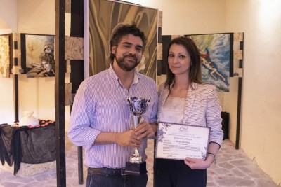 L'assessore Calabrò premia il primo classificato Sergio Bertolino