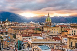 Palermo,,Sicily,Town,Skyline,With,Landmark,Towers,At,Dusk 