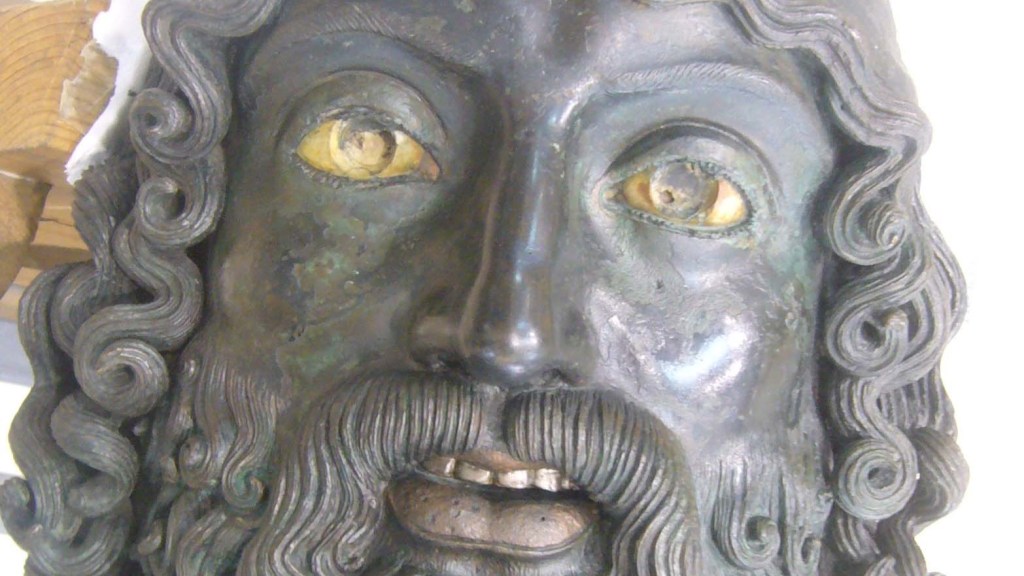 GIOVANE viso bronzo