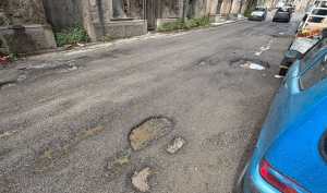 via nazionale archi degrado buche