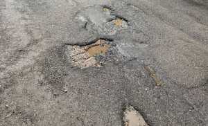 via nazionale archi degrado buche